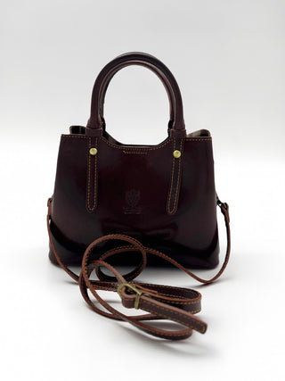 NORA  in pelle conciata al vegetale.