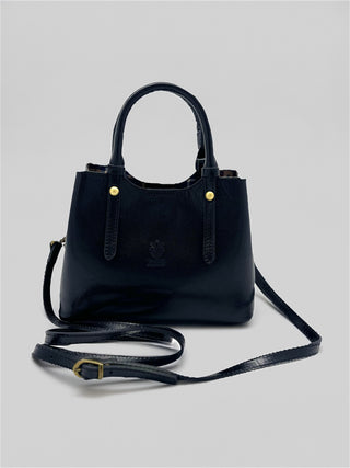 NORA  in pelle conciata al vegetale.