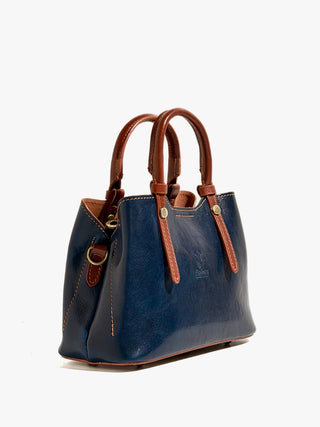 NORA in vegetable tanned leather.